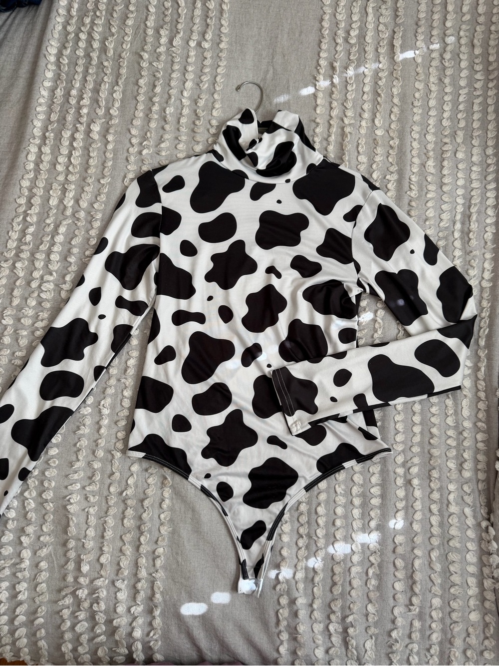 Black & White Cow Print Turtleneck Bodysuit